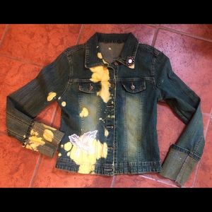 Denim appliqué jacket with yellow bleach designs